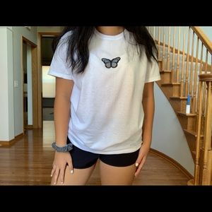 Brandy Melville Tops - blue butterfly patch tee Brandy Melville Tops - blue butterfly patch tee